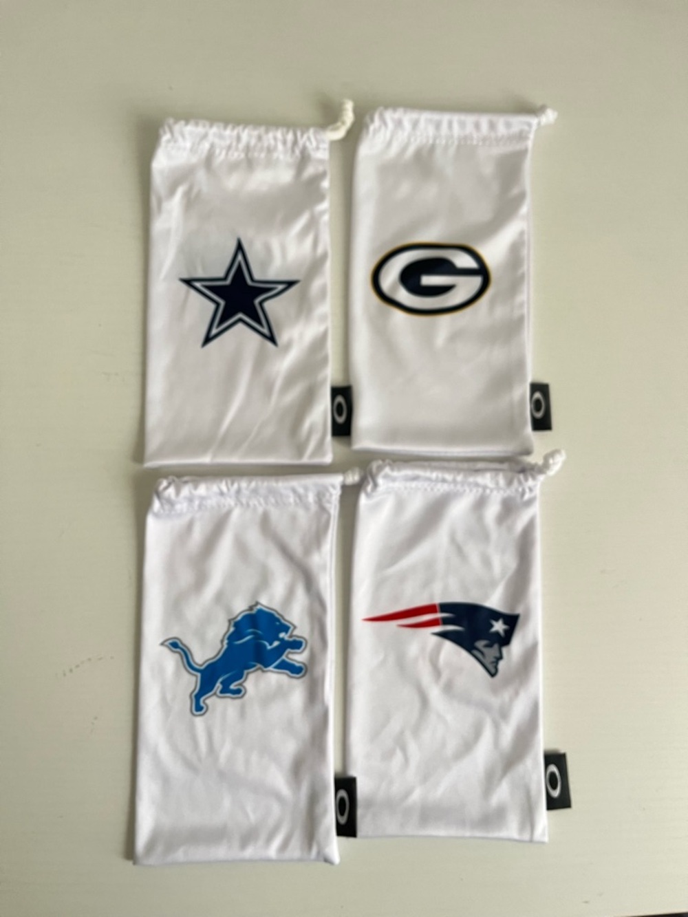 OAKLEY NFL Team Logo Sunglass Pouches - Cowboys, Packers, Lions, Patriots